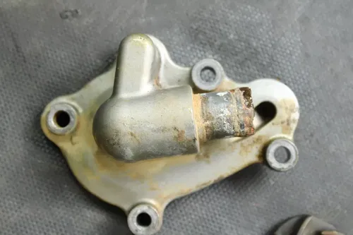 2014 Honda Crf250l OEM Water Pump Cover & Impeller  B4457