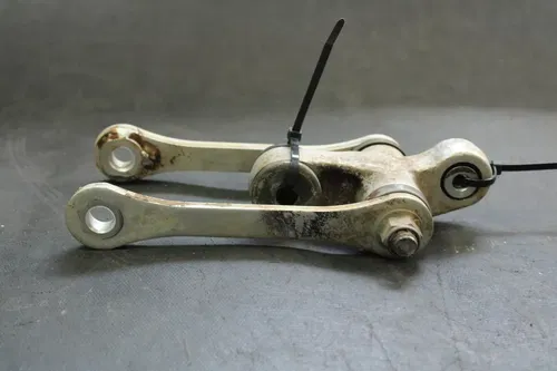 1990 Suzuki Dr250 OEM Shock Linkage  B4429