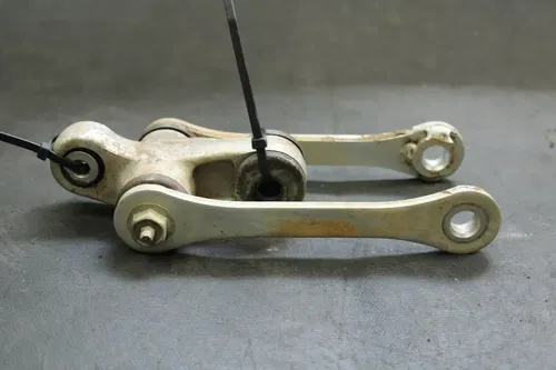 1990 Suzuki Dr250 OEM Shock Linkage  B4429