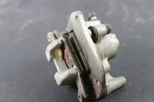2008 YAMAHA GRIZZLY 700 OEM LEFT REAR BACK BRAKE CALIPER B4450