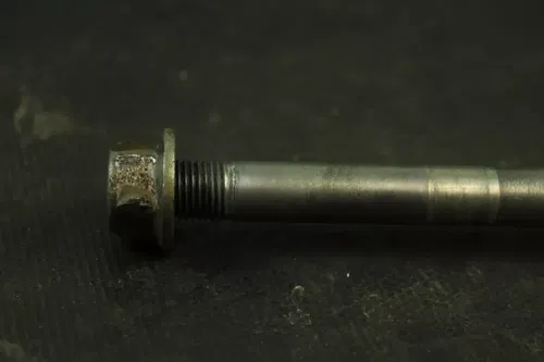2003 Kawasaki Kx85 OEM Front Axle  B4485