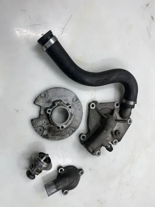 2010 Arctic Cat Sno Pro 600 Thermostat Stator Base Plate Water Pump Cover