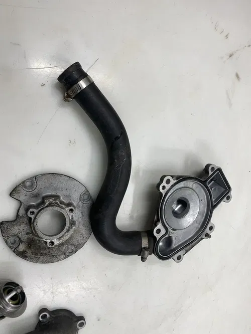 2010 Arctic Cat Sno Pro 600 Thermostat Stator Base Plate Water Pump Cover