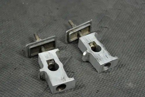1998 SUZUKI RM80 OEM SWINGARM CHAIN TENSIONER ADJUSTMENT BRACKETS
