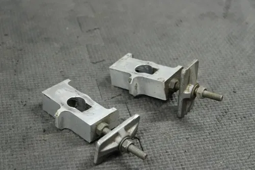 1998 SUZUKI RM80 OEM SWINGARM CHAIN TENSIONER ADJUSTMENT BRACKETS
