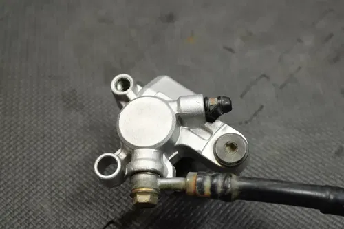 1999 SUZUKI RM250 OEM REAR BACK BRAKE CALIPER MASTER CYLINDER LEVER NEEDS WORK!
