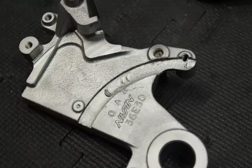 1999 SUZUKI RM250 OEM REAR BACK BRAKE CALIPER MASTER CYLINDER LEVER NEEDS WORK!