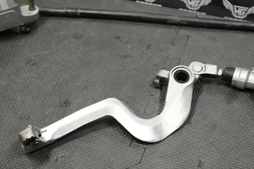 1999 SUZUKI RM250 OEM REAR BACK BRAKE CALIPER MASTER CYLINDER LEVER NEEDS WORK!