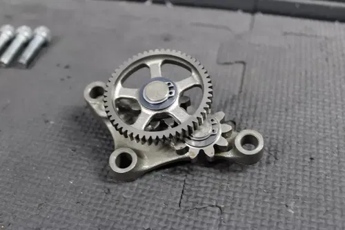 2004 HONDA CRF250X 04-09 OEM ENGINE MOTOR STARTER REDUCTION GEAR HOLDER ASSEMBLY