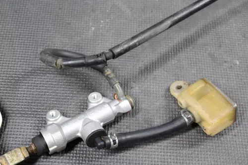 1999 YAMAHA YZ400F OEM NISSIN REAR BACK BRAKE CALIPER MASTER CYLINDER LEVER
