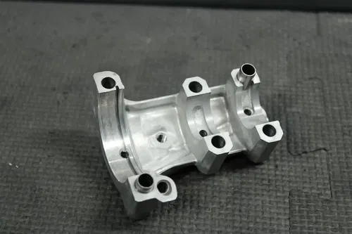 2005 YAMAHA YZ450F OEM ENGINE INTAKE CAMSHAFT CAP HOLDER 5XD-11102-00-00