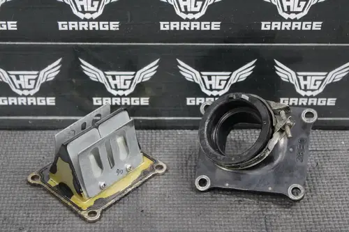 1996 SUZUKI RM125 OEM INTAKE REED BLOCK ASSEMBLY 13110-36E01