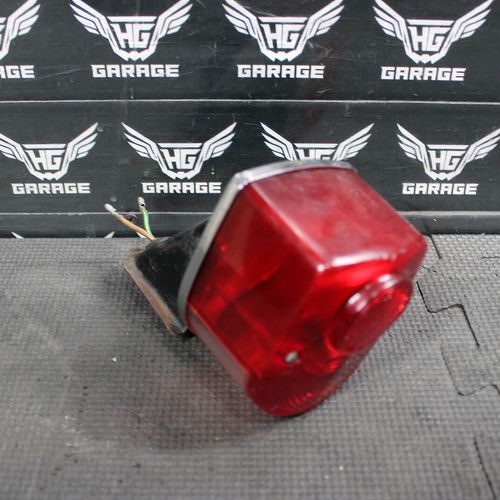 1976 HONDA Z50A OEM REAR BACK TAIL LIGHT MOUNT BRACKET 33701-120-000