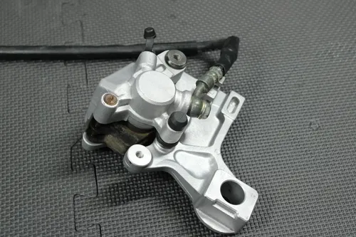 2001 99-01 KAWASAKI KX125 OEM REAR BACK BRAKE CALIPER MASTER CYLINDER LEVER GOOD