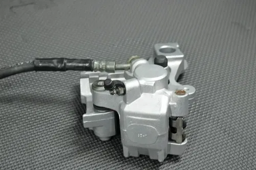 2001 99-01 KAWASAKI KX125 OEM REAR BACK BRAKE CALIPER MASTER CYLINDER LEVER GOOD