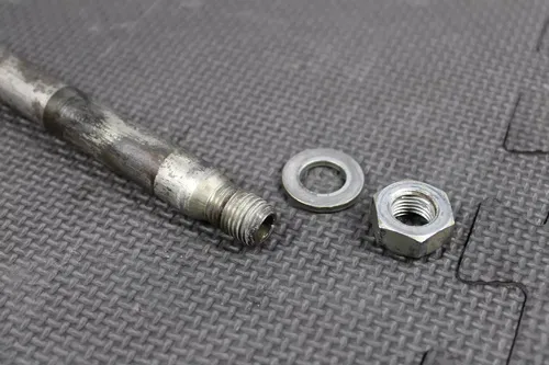 2007 HONDA CRF250R OEM REAR BACK SWINGARM BOLT SUSPENSION PIVOT AXLE 52101-KZ4-J