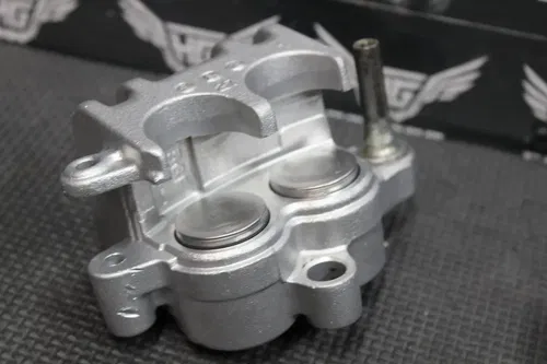 1999 SUZUKI RM125 OEM REAR BACK BRAKE CALIPER NEEDS REBUILD!