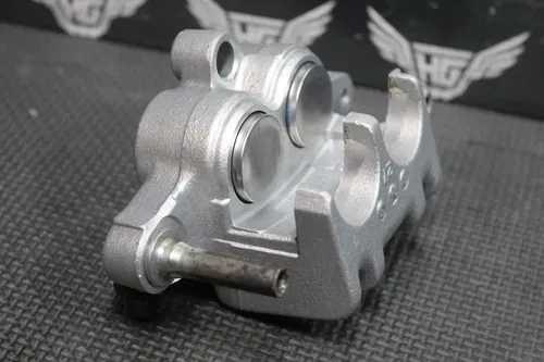 1999 SUZUKI RM125 OEM REAR BACK BRAKE CALIPER NEEDS REBUILD!