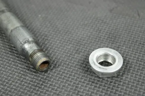 2006 HONDA CRF450R OEM FRONT WHEEL RIM AXLE PIVOT BOLT 44301-MEN-000