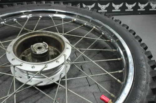 2005 04-06 KAWASAKI KLX125 OEM 17" X 1.40"  FRONT WHEEL RIM HUB SPOKES ASSEMBLY