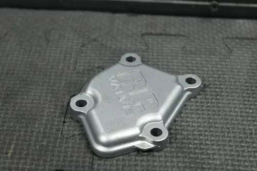 2005 HONDA CR125R ENGINE CYLINDER JUG LEFT SIDE COVER POWER VALVE 12107-KSR-730
