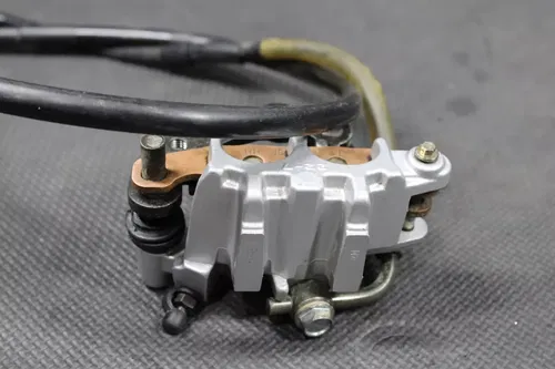 2003 SUZUKI RM100 OEM TOKICO FRONT BRAKE CALIPER K4308-00008