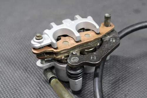 2003 SUZUKI RM100 OEM TOKICO FRONT BRAKE CALIPER K4308-00008
