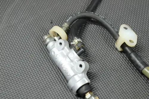 1999 KAWASAKI 98-00 KX100 BIGWHEEL OEM REAR BACK BRAKE CALIPER MASTER CYLINDER