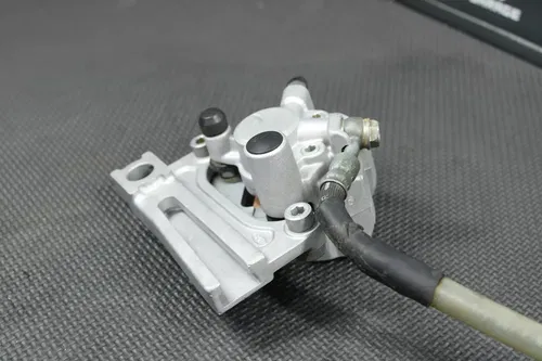 1999 KAWASAKI 98-00 KX100 BIGWHEEL OEM REAR BACK BRAKE CALIPER MASTER CYLINDER