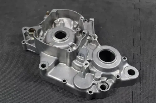 1999 SUZUKI RM125 OEM LEFT ENGINE MOTOR CRANKCASE CRANK CASE BOTTOM END