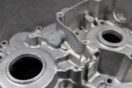 1999 SUZUKI RM125 OEM LEFT ENGINE MOTOR CRANKCASE CRANK CASE BOTTOM END