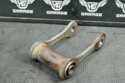2004 SUZUKI DRZ125L DRZ125 OEM REAR SHOCK LINKAGE RELAY ARM CUSHION LEVER