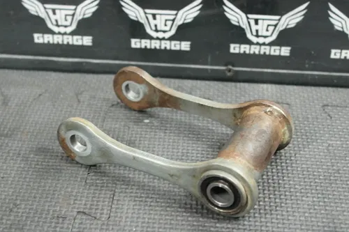 2004 SUZUKI DRZ125L DRZ125 OEM REAR SHOCK LINKAGE RELAY ARM CUSHION LEVER
