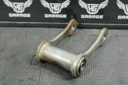 2004 SUZUKI DRZ125L DRZ125 OEM REAR SHOCK LINKAGE RELAY ARM CUSHION LEVER