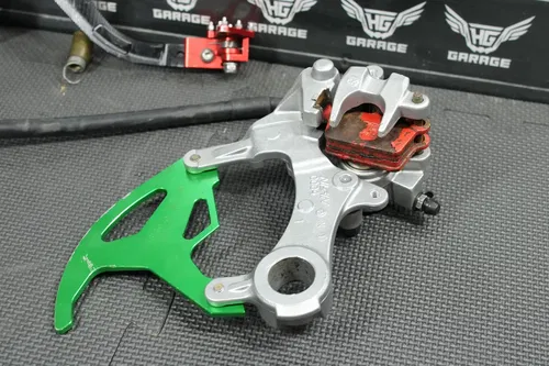 2006 KAWASAKI KX250F OEM REAR BACK BRAKE CALIPER MASTER CYLINDER NEEDS WORK!