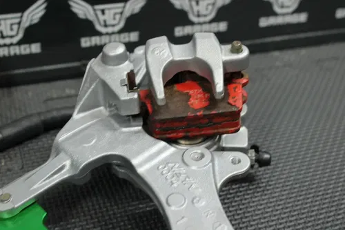 2006 KAWASAKI KX250F OEM REAR BACK BRAKE CALIPER MASTER CYLINDER NEEDS WORK!