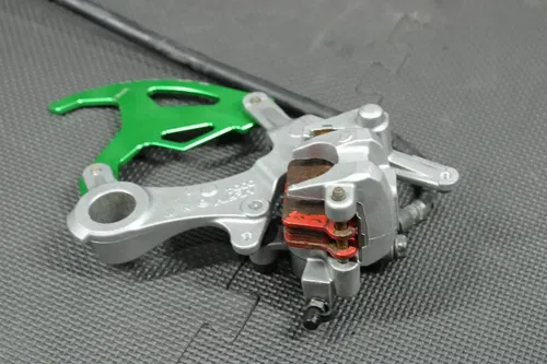 2006 KAWASAKI KX250F OEM REAR BACK BRAKE CALIPER MASTER CYLINDER NEEDS WORK!