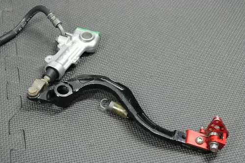 2006 KAWASAKI KX250F OEM REAR BACK BRAKE CALIPER MASTER CYLINDER NEEDS WORK!