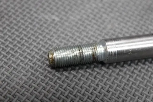1987 HONDA XR250R OEM FRONT WHEEL RIM AXLE PIVOT BOLT 44301-KBR-000