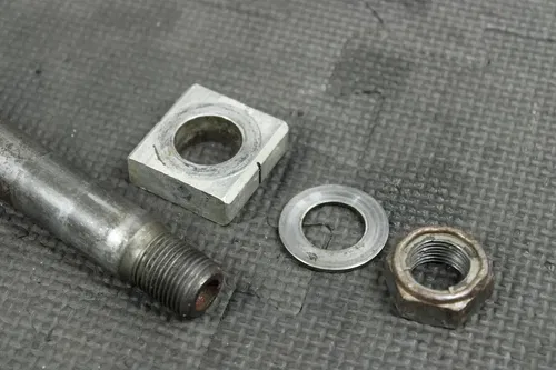 1999 HONDA CR125R OEM REAR AXLE BACK WHEEL RIM PIVOT BOLT AXEL