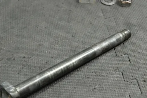 1999 HONDA CR125R OEM REAR AXLE BACK WHEEL RIM PIVOT BOLT AXEL