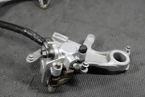 2006 05-07 HONDA CRF450R OEM NISSIN REAR BACK BRAKE CALIPER MASTER CYLINDER LEVE