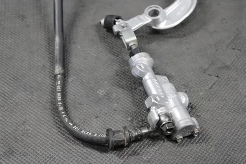 2006 05-07 HONDA CRF450R OEM NISSIN REAR BACK BRAKE CALIPER MASTER CYLINDER LEVE
