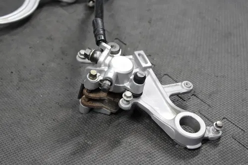 2006 05-07 HONDA CRF450R OEM NISSIN REAR BACK BRAKE CALIPER MASTER CYLINDER LEVE