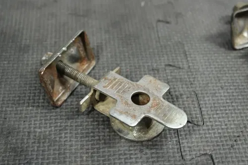 2004 SUZUKI DRZ125 DRZ125L OEM SWINGARM CHAIN TENSIONER ADJUSTER HARDWARE BLOCK