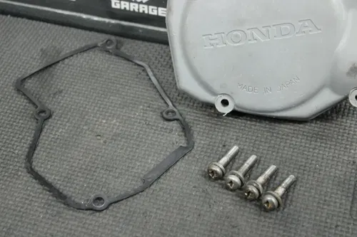 1999 HONDA CR125R OEM ENGINE MOTOR STATOR GENERATOR MAGNETO COVER 11350-KZ4-620