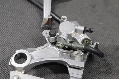 2003 KAWASAKI KX250 OEM NISSIN REAR BACK BRAKE CALIPER MASTER CYLINDER LEVER