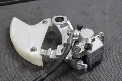 2003 KAWASAKI KX250 OEM NISSIN REAR BACK BRAKE CALIPER MASTER CYLINDER LEVER
