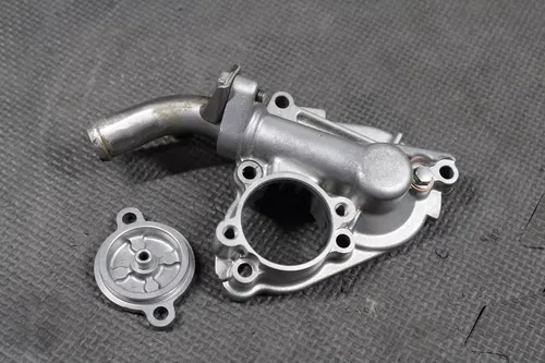 04-08 KAWASAKI KX250F OEM ENGINE MOTOR INNER CLUTCH COVER WATERPUMP 14032-0057