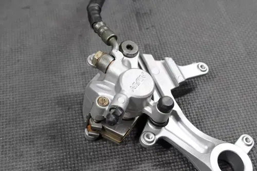 2007 SUZUKI RMZ250 OEM NISSIN REAR BACK BRAKE CALIPER MASTER CYLINDER LEVER